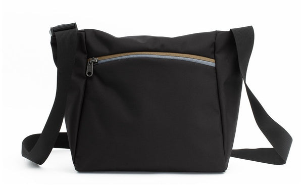 Reverse shot of an Icon in Black 525 Ballistic with multicolor zippers.